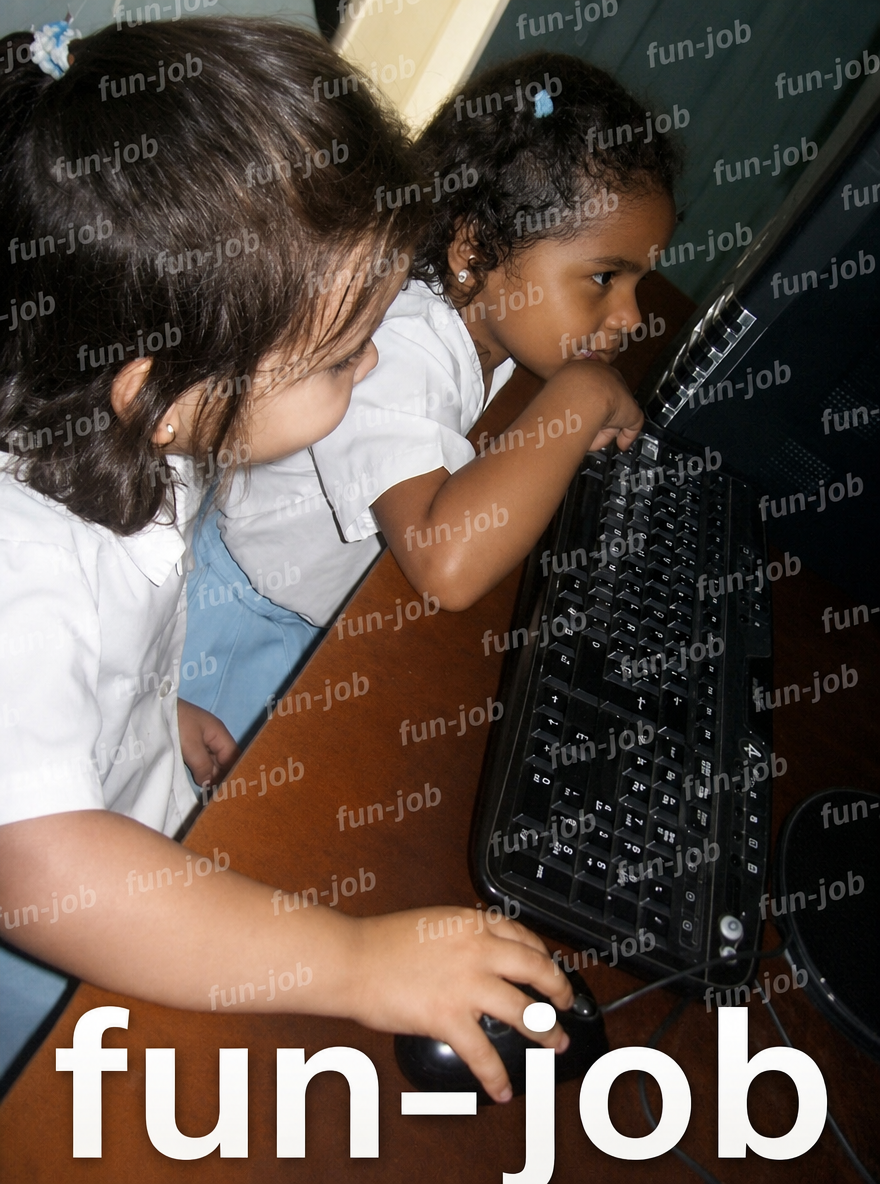 Two small children at a computer keyboard
